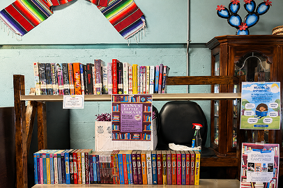 REPLACE → cozy reading nook, books, coffee, warm light